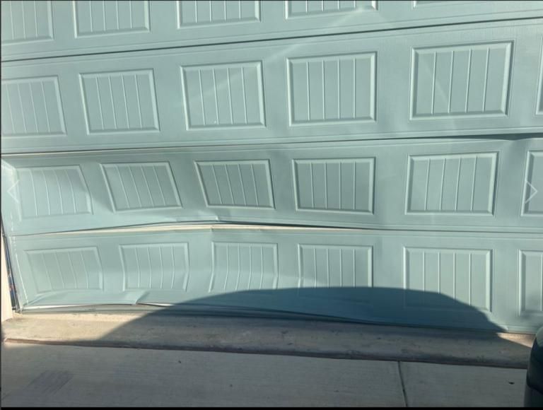 imperial garage door repair company - broken garage door