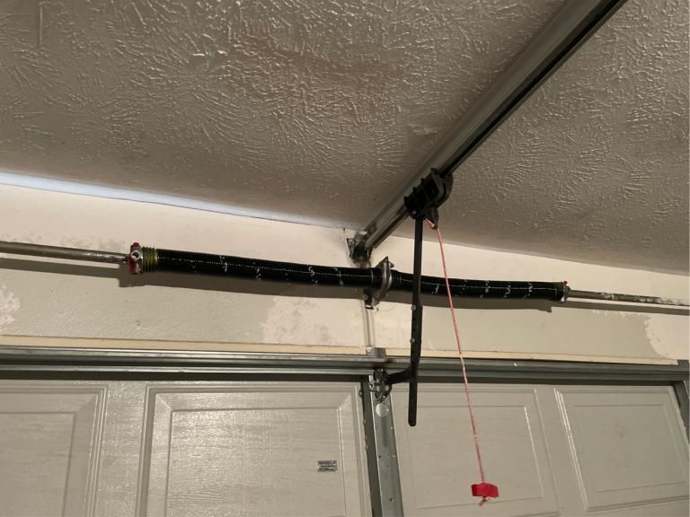 garage door spring repair in garland tx