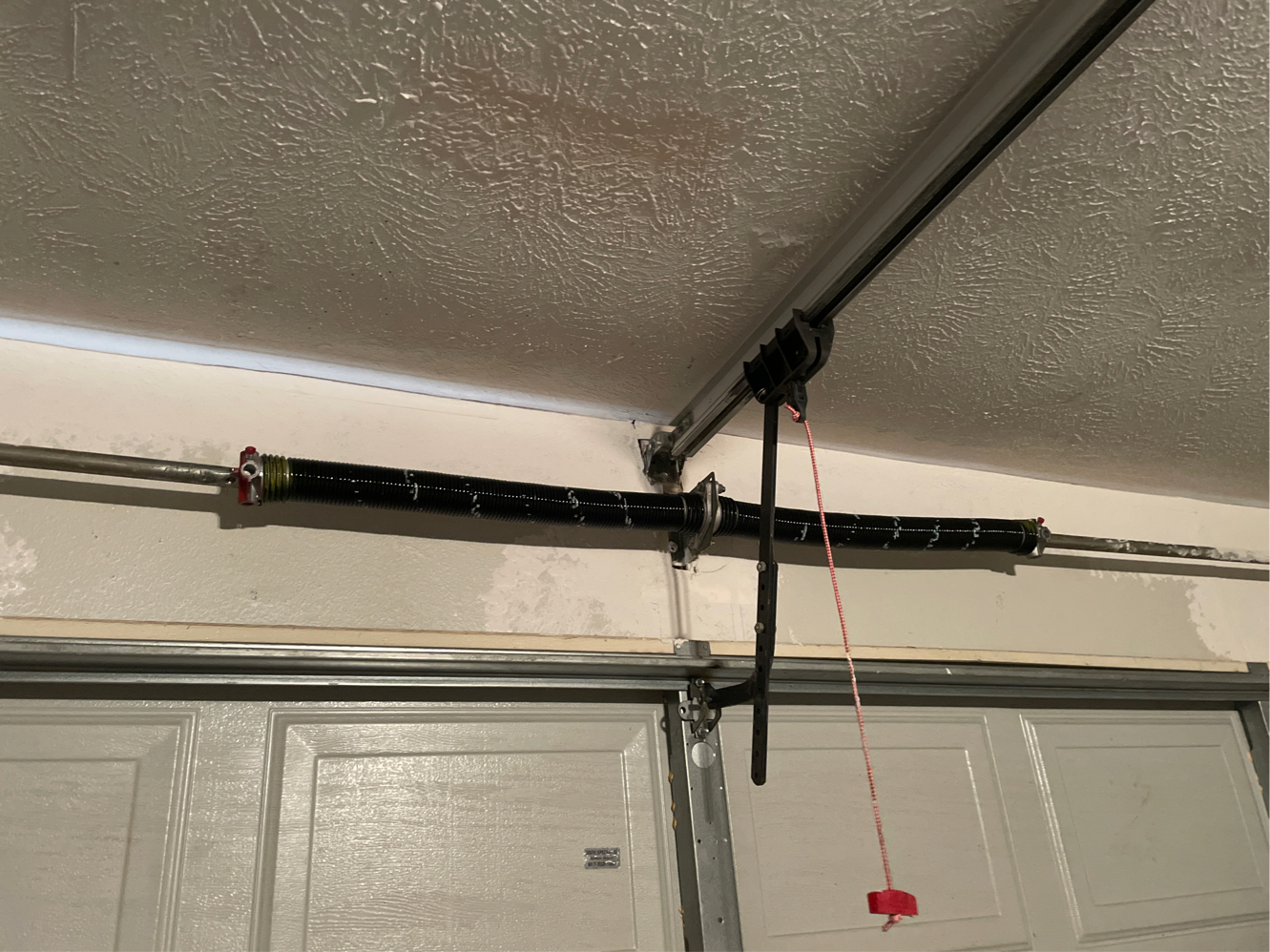 garage door spring repair in garland tx