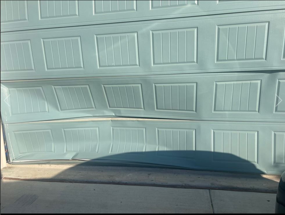 imperial garage door repair company - broken garage door